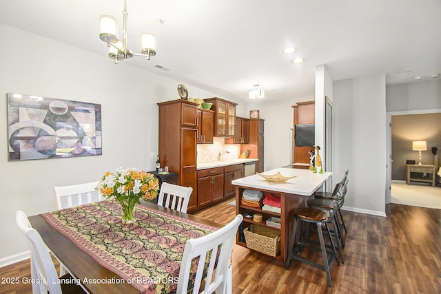 3706 Flying Gulch Dr, Holt, MI 48842 - dining space featuring dark wood-style floors, a chandelier, and recessed lighting