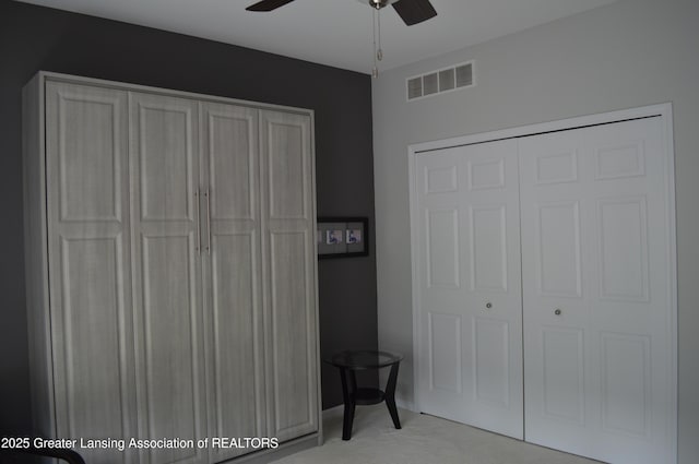 3706 Flying Gulch Dr, Holt, MI 48842 - unfurnished bedroom with a ceiling fan and light colored carpet