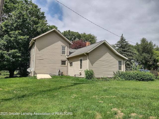 16711 Stark Rd, Springport, MI 49284 - rear view of property with a lawn
