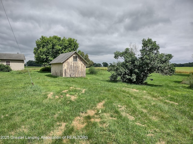 16711 Stark Rd, Springport, MI 49284 - view of grassy yard with a shed and a view of rural / pastoral area