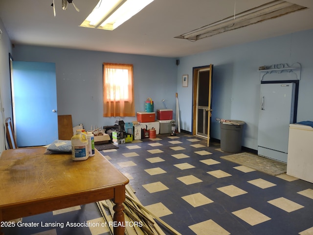 16711 Stark Rd, Springport, MI 49284 - misc room with tile patterned floors and attic access