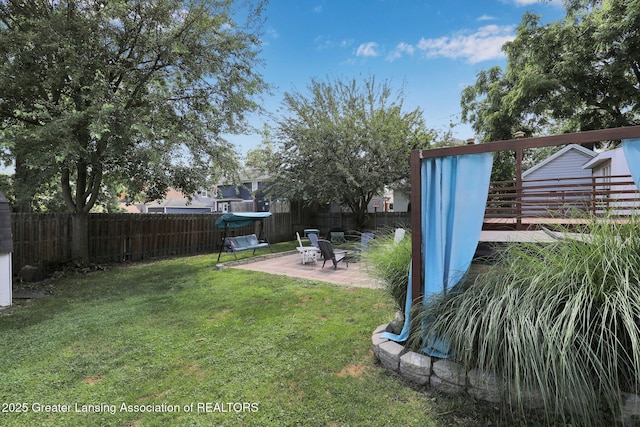302 E State St, Saint Johns, MI 48879 - fenced backyard with a patio area