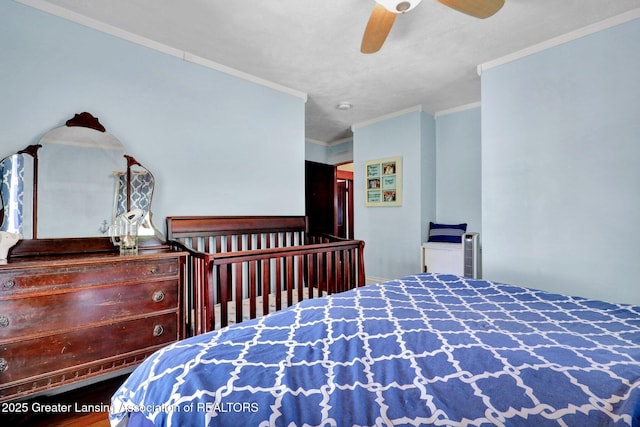 302 E State St, Saint Johns, MI 48879 - bedroom featuring crown molding and a ceiling fan