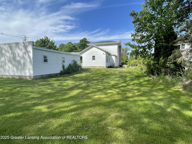 2111 Cedar St, Holt, MI 48842 - view of green lawn