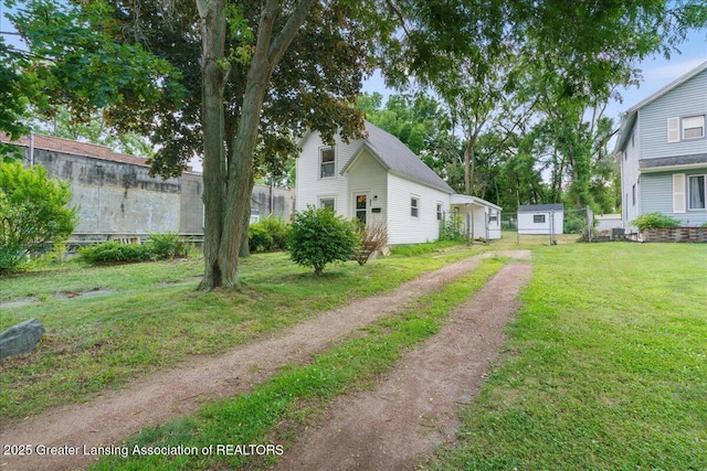 625 W Jefferson St, Grand Ledge, MI 48837 - view of yard with dirt driveway