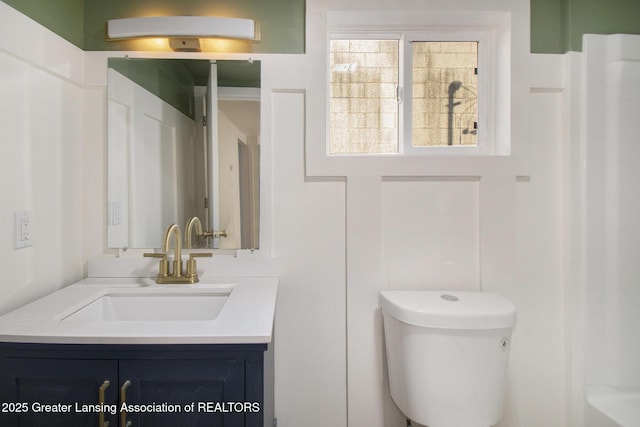 625 W Jefferson St, Grand Ledge, MI 48837 - full bath featuring vanity and toilet