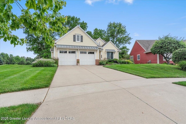 3537 Winborn Dr, Dewitt, MI 48820 - traditional-style house featuring concrete driveway, a standing seam roof, a front lawn, a metal roof, and an attached garage