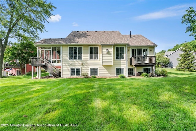 3537 Winborn Dr, Dewitt, MI 48820 - back of property featuring a sunroom, a wooden deck, a lawn, and stairway