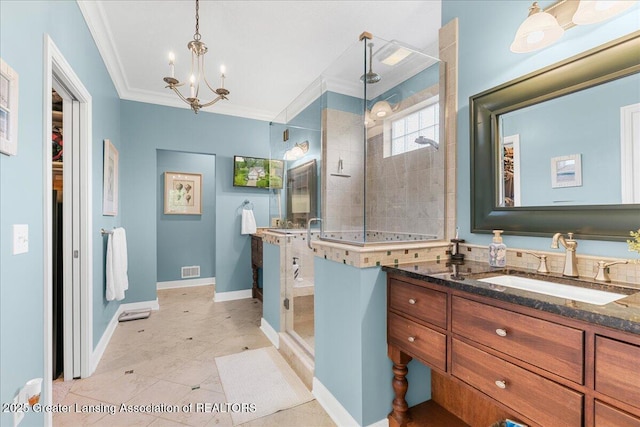 3537 Winborn Dr, Dewitt, MI 48820 - full bath with vanity, ornamental molding, a chandelier, a tile shower, and tile patterned floors