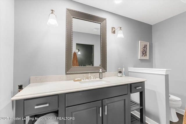 3537 Winborn Dr, Dewitt, MI 48820 - bathroom with vanity and toilet