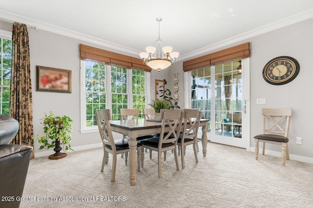 3537 Winborn Dr, Dewitt, MI 48820 - carpeted dining room featuring crown molding and a chandelier