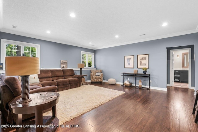 3537 Winborn Dr, Dewitt, MI 48820 - living room with crown molding, recessed lighting, and wood finished floors