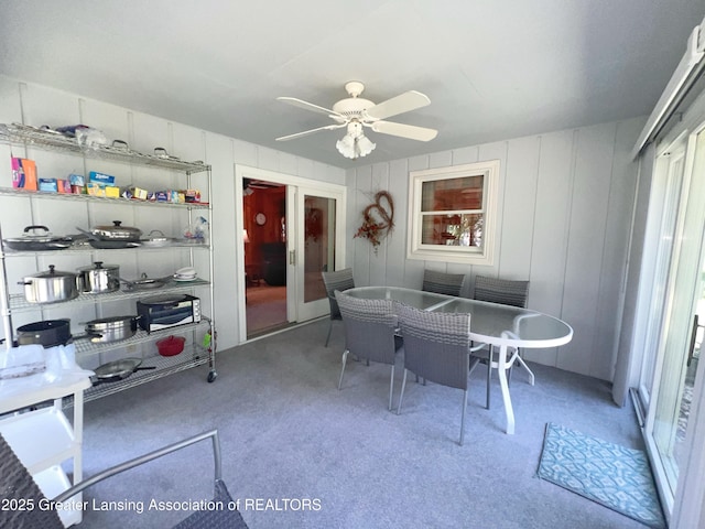 6716 Bunker Hill Dr, Lansing, MI 48906 - carpeted dining room featuring a ceiling fan