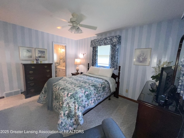 6716 Bunker Hill Dr, Lansing, MI 48906 - bedroom featuring wallpapered walls, carpet floors, ceiling fan, and ensuite bathroom