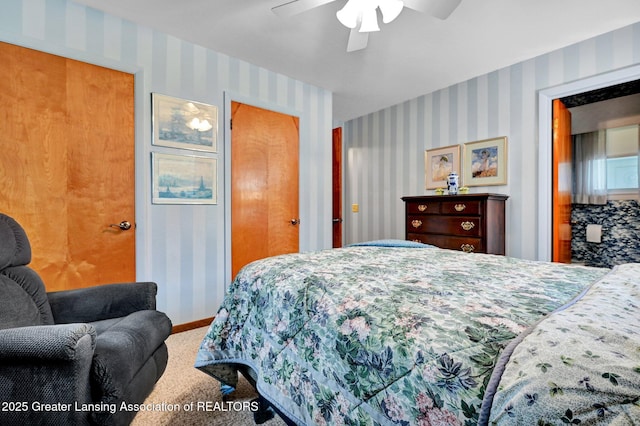 6716 Bunker Hill Dr, Lansing, MI 48906 - bedroom featuring wallpapered walls, carpet flooring, and a ceiling fan