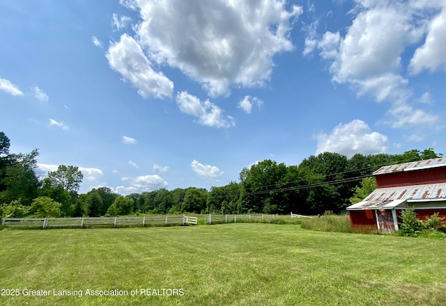 3534 S Perkey Rd, Charlotte, MI 48813 - view of yard featuring a barn and an outbuilding