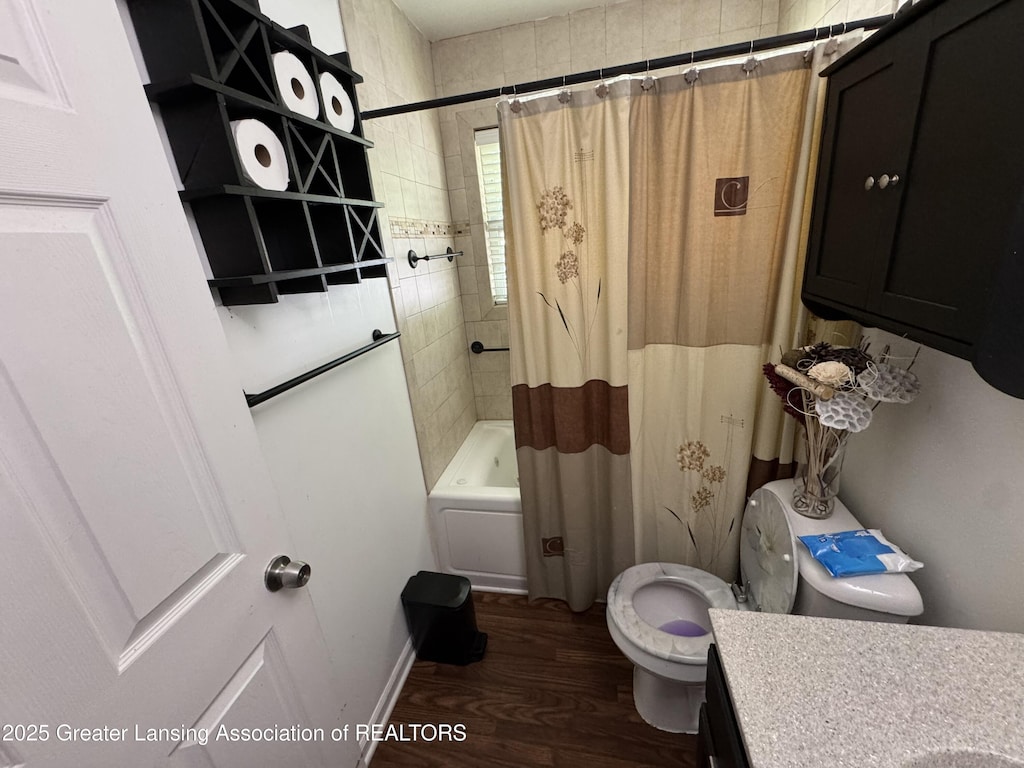 816 Arcola St, Garden City, MI 48135 - bathroom with vanity, wood finished floors, and shower / bath combo