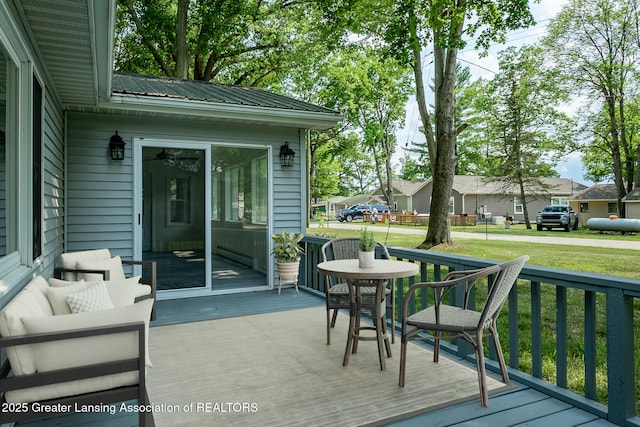 1337 Shepard St, Crystal, MI 48818 - wooden terrace with a yard, a residential view, and outdoor lounge area