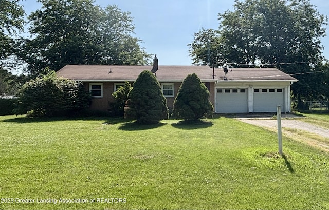 1214 Otto Rd Unit R1, Charlotte, MI 48813 - ranch-style house with driveway, an attached garage, a front yard, and a chimney