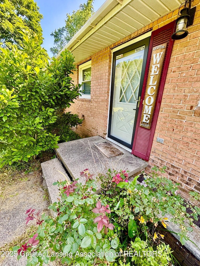 1214 Otto Rd Unit R1, Charlotte, MI 48813 - entrance to property featuring brick siding