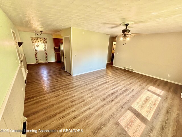1214 Otto Rd Unit R1, Charlotte, MI 48813 - empty room featuring wood finished floors and ceiling fan