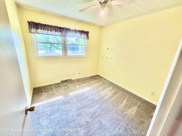 1214 Otto Rd Unit R1, Charlotte, MI 48813 - carpeted spare room featuring ceiling fan and baseboards