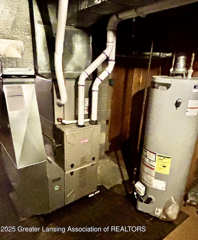 1214 Otto Rd Unit R1, Charlotte, MI 48813 - utility room with gas water heater and heating unit
