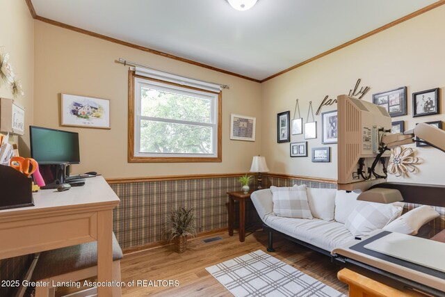 1220 Seymour St, Grand Ledge, MI 48837 - home office with a wainscoted wall, wood finished floors, and crown molding