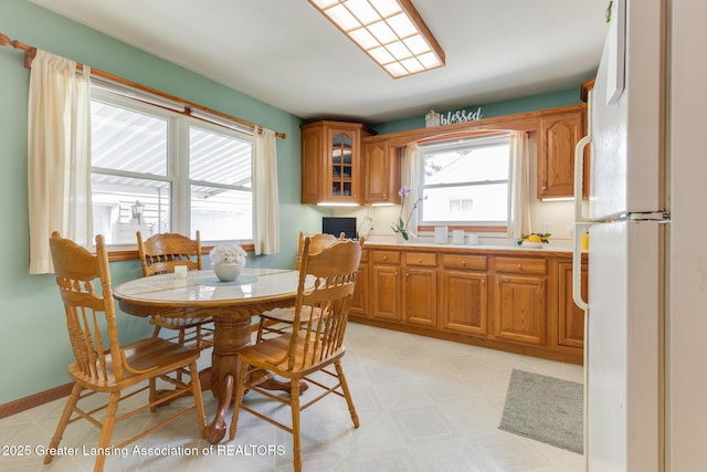 1220 Seymour St, Grand Ledge, MI 48837 - dining room featuring light flooring