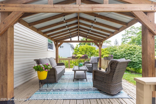 1220 Seymour St, Grand Ledge, MI 48837 - wooden deck with an outdoor living space and a gazebo