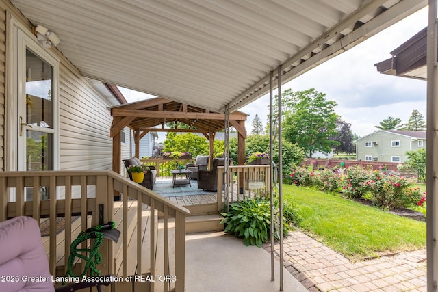 1220 Seymour St, Grand Ledge, MI 48837 - view of patio / terrace featuring a gazebo and a deck