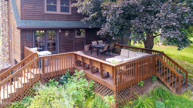 3536 N Royston Rd, Potterville, MI 48876 - wooden deck with stairway, a grill, and an outdoor hangout area
