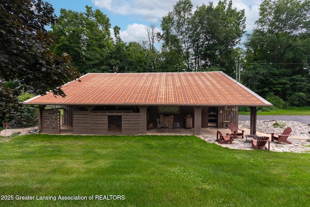 3536 N Royston Rd, Potterville, MI 48876 - view of front of home with a front lawn and a patio