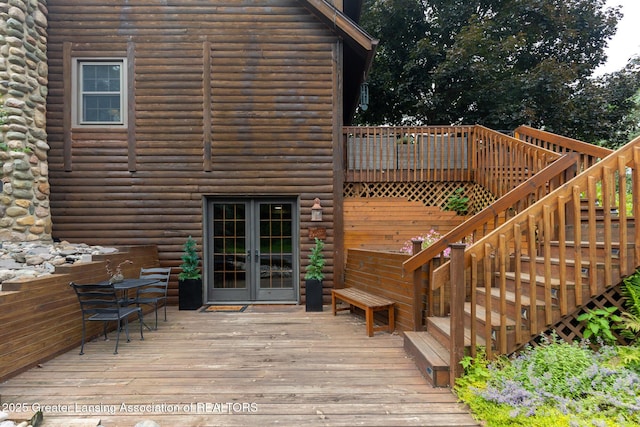 3536 N Royston Rd, Potterville, MI 48876 - wooden terrace with french doors and stairs