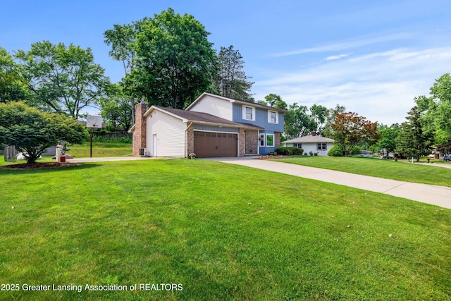 4629 Grandwoods Dr, Lansing, MI 48917 - traditional-style home with an attached garage, a front lawn, driveway, a chimney, and brick siding