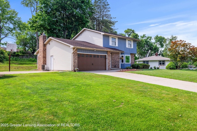 4629 Grandwoods Dr, Lansing, MI 48917 - traditional-style house with driveway, a front lawn, a chimney, brick siding, and a garage