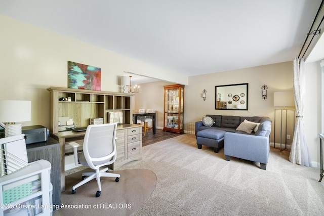4629 Grandwoods Dr, Lansing, MI 48917 - office area featuring carpet floors, a chandelier, and radiator heating unit