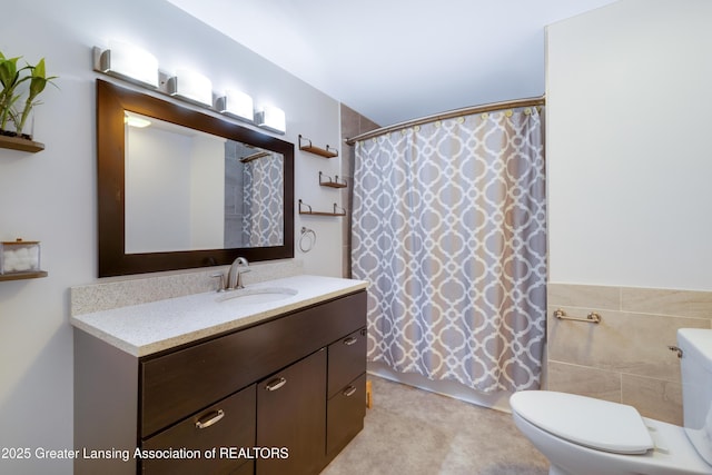 4629 Grandwoods Dr, Lansing, MI 48917 - full bathroom with vanity and a shower with curtain