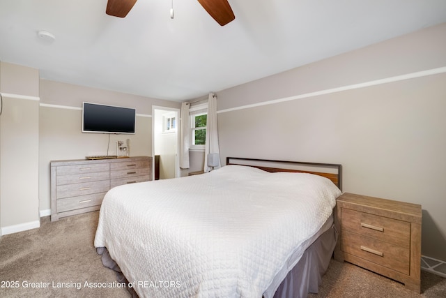4629 Grandwoods Dr, Lansing, MI 48917 - bedroom with carpet floors and ceiling fan