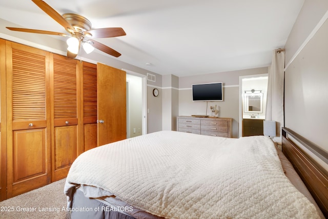 4629 Grandwoods Dr, Lansing, MI 48917 - bedroom with ensuite bathroom and a ceiling fan