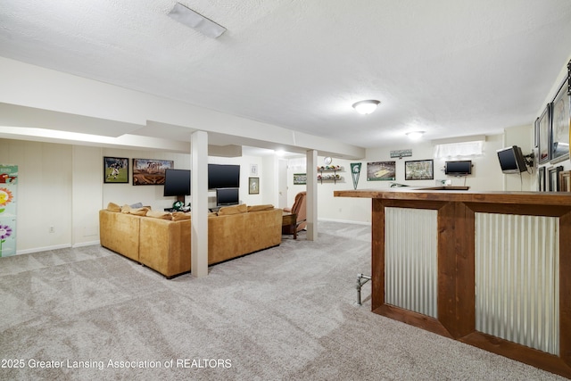 4629 Grandwoods Dr, Lansing, MI 48917 - living room featuring carpet, a textured ceiling, and bar