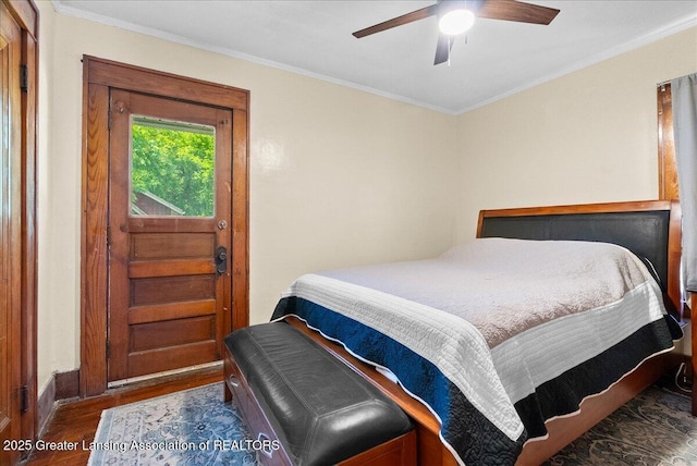 700 S Pennsylvania Ave, Lansing, MI 48912 - bedroom featuring wood finished floors, ornamental molding, and ceiling fan
