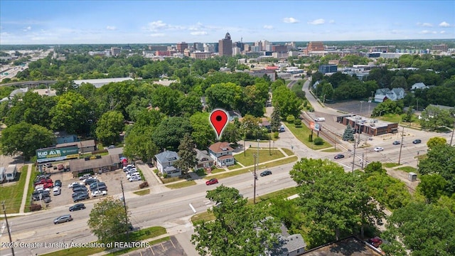 700 S Pennsylvania Ave, Lansing, MI 48912 - aerial overview of property's location featuring nearby urban area and a tree filled landscape
