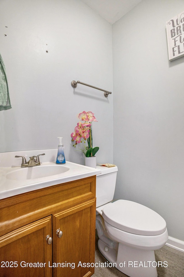 4326 Manitou Dr, Okemos, MI 48864 - half bathroom with vanity and toilet