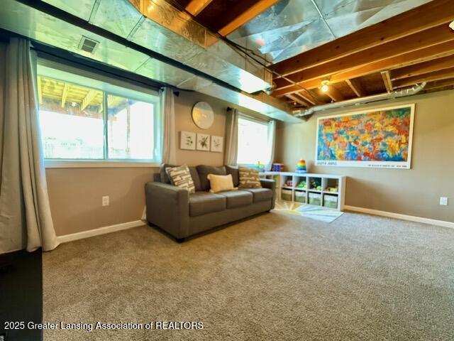 310 Brittany Ln, Mulliken, MI 48861 - carpeted living area with baseboards