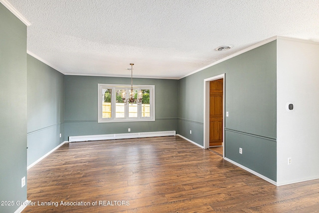 608 Belknap St, Grand Ledge, MI 48837 - empty room featuring a baseboard heating unit, ornamental molding, a textured ceiling, wood finished floors, and a chandelier