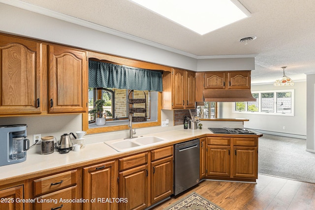 608 Belknap St, Grand Ledge, MI 48837 - kitchen with stainless steel dishwasher, brown cabinetry, crown molding, a peninsula, and light countertops