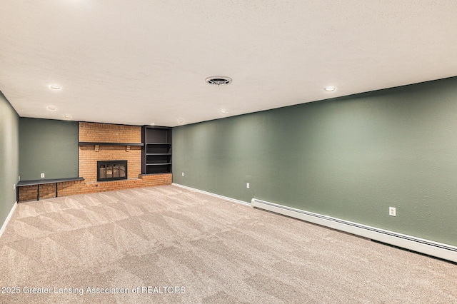 608 Belknap St, Grand Ledge, MI 48837 - unfurnished living room with baseboard heating, carpet flooring, a fireplace, and recessed lighting