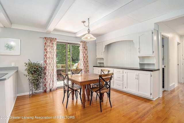 320 Mark St, Spring Lake, MI 49456 - dining area with light wood-style floors and beamed ceiling