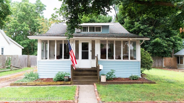 4461 Holt Rd, Holt, MI 48842 - bungalow-style house featuring roof with shingles
